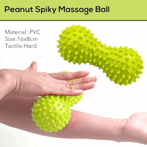 Grüne Erdnuss-förmige Spiky-Massageball auf Arm
